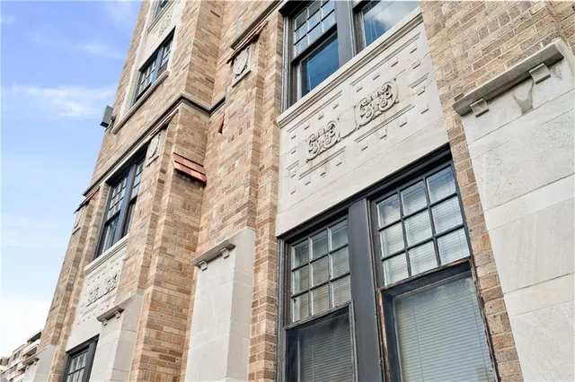 a view of a building with a street
