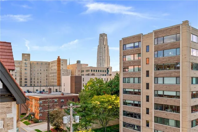 a view of a city with tall buildings
