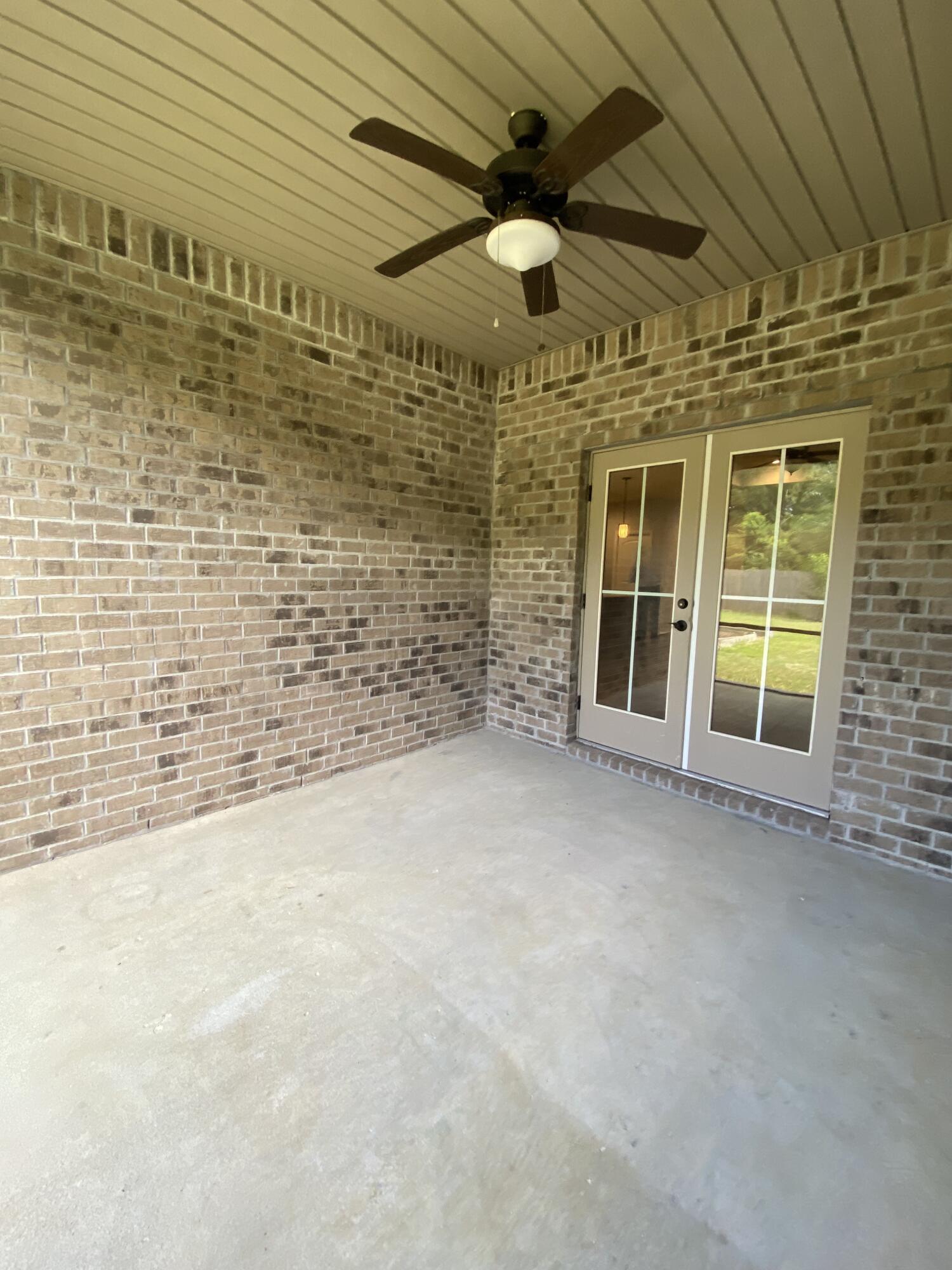 3909 Fielding Court Pace, FL 32571 - Photo 19 of 25 a view of an empty room with a window