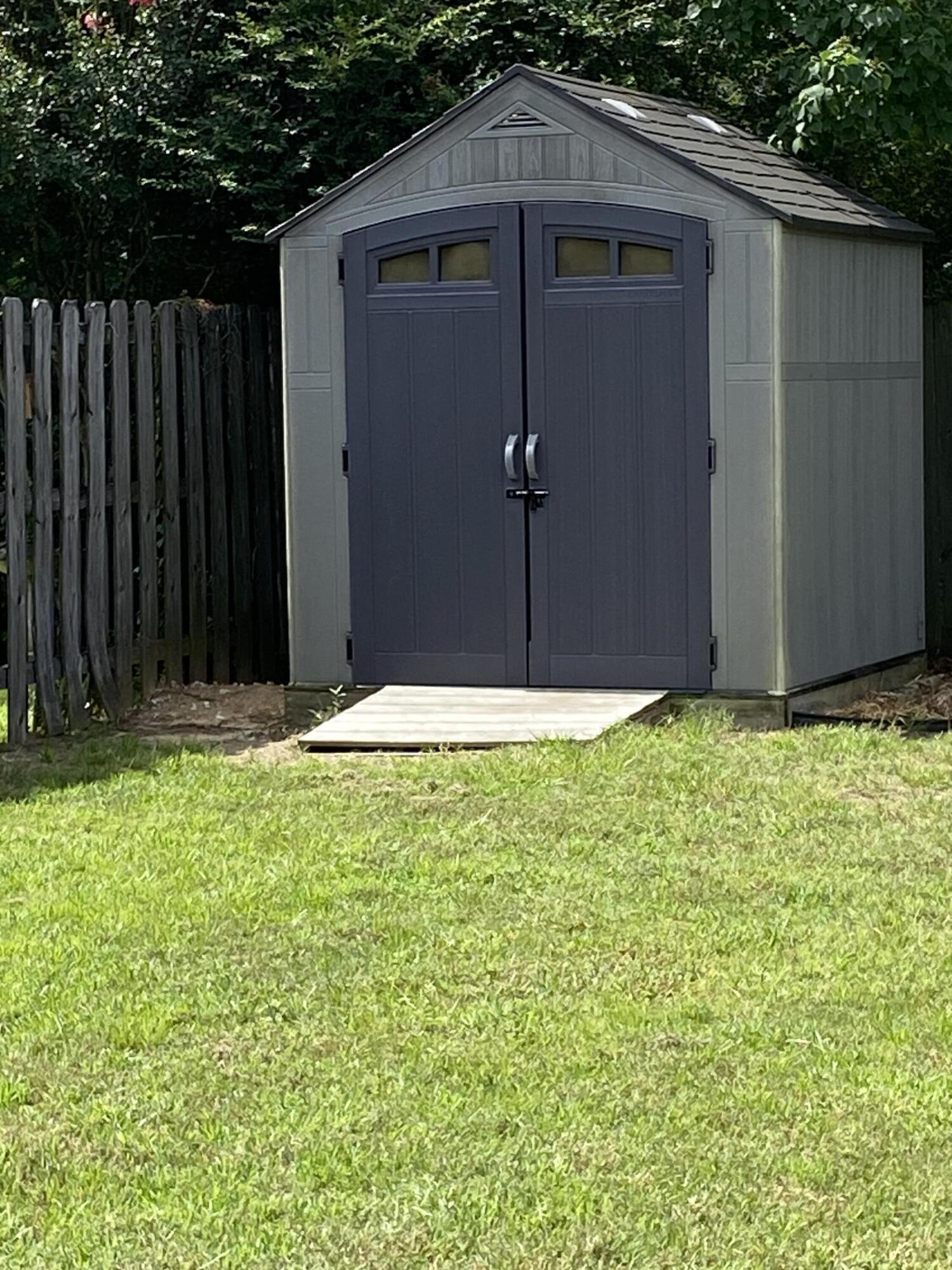 3909 Fielding Court Pace, FL 32571 - Photo 23 of 25 a house with swimming pool in front of it
