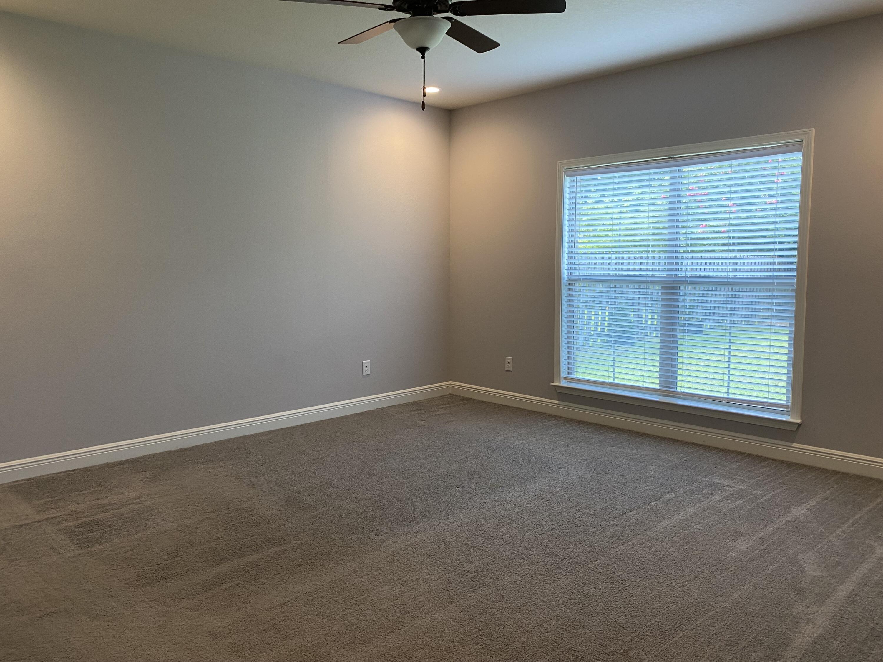 3909 Fielding Court Pace, FL 32571 - Photo 9 of 25 an empty room with a window