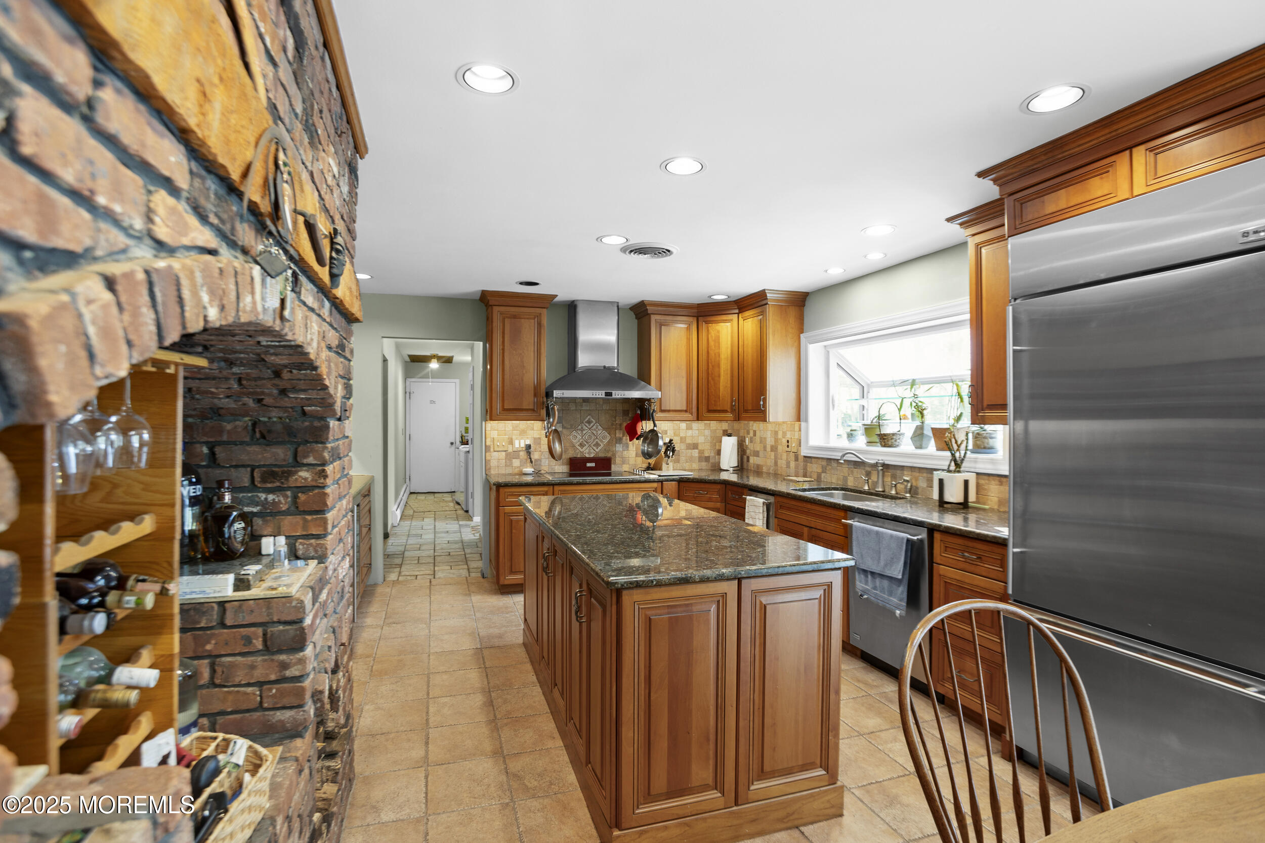 156 Sams Road Jackson, NJ 08527 - Photo 16 of 46 a kitchen with stainless steel appliances granite countertop a stove a sink and a refrigerator