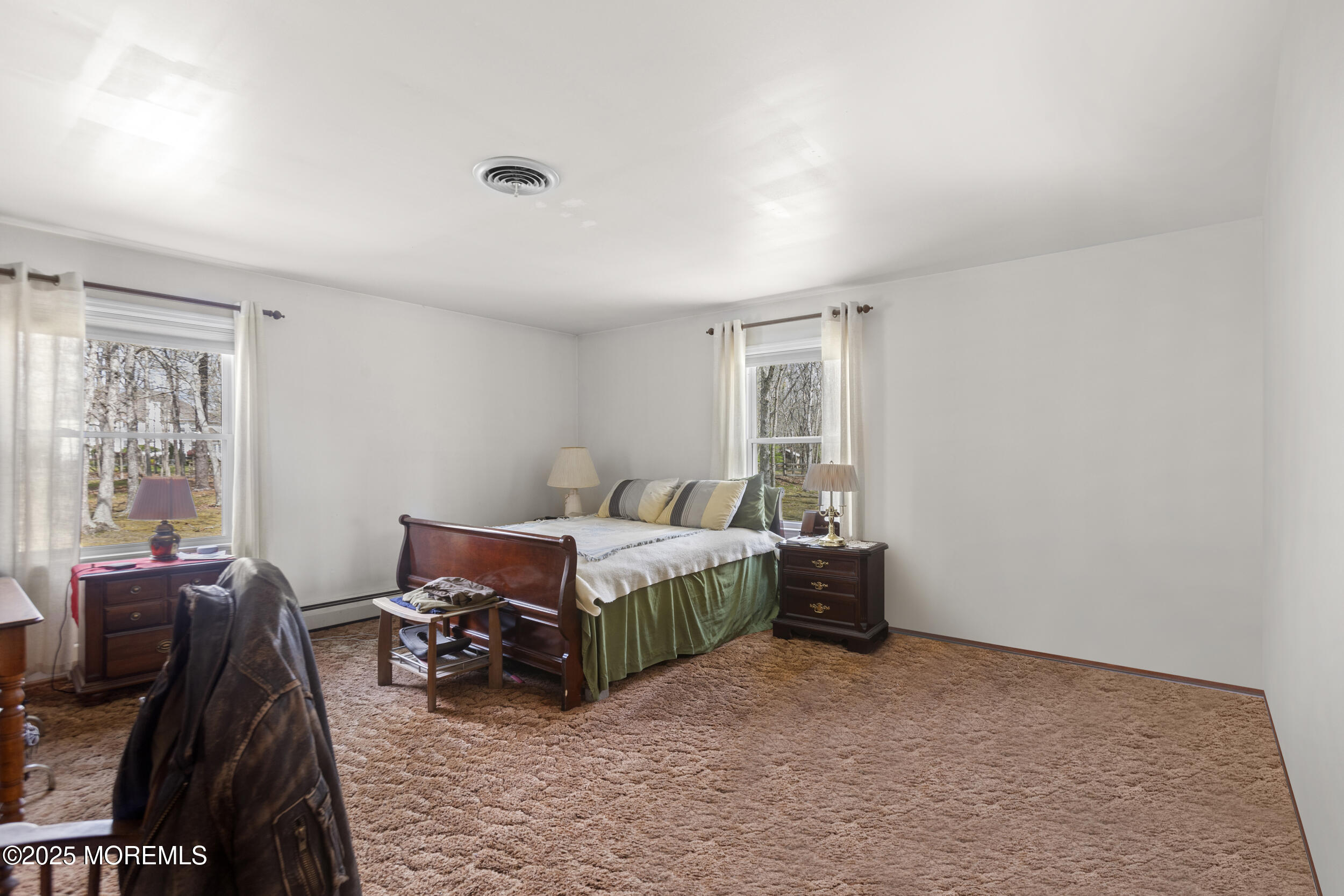 156 Sams Road Jackson, NJ 08527 - Photo 30 of 46 a bedroom with furniture and a window