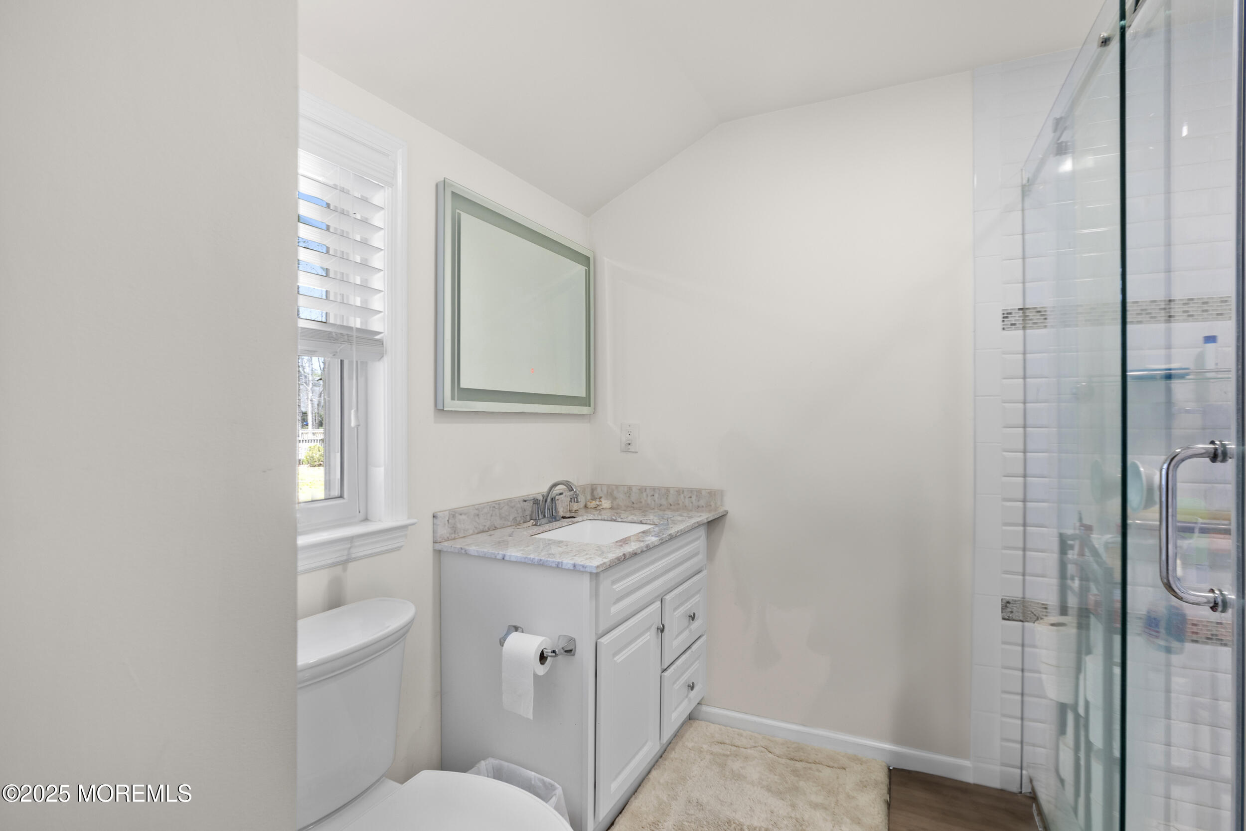 156 Sams Road Jackson, NJ 08527 - Photo 32 of 46 a bathroom with a toilet sink and mirror