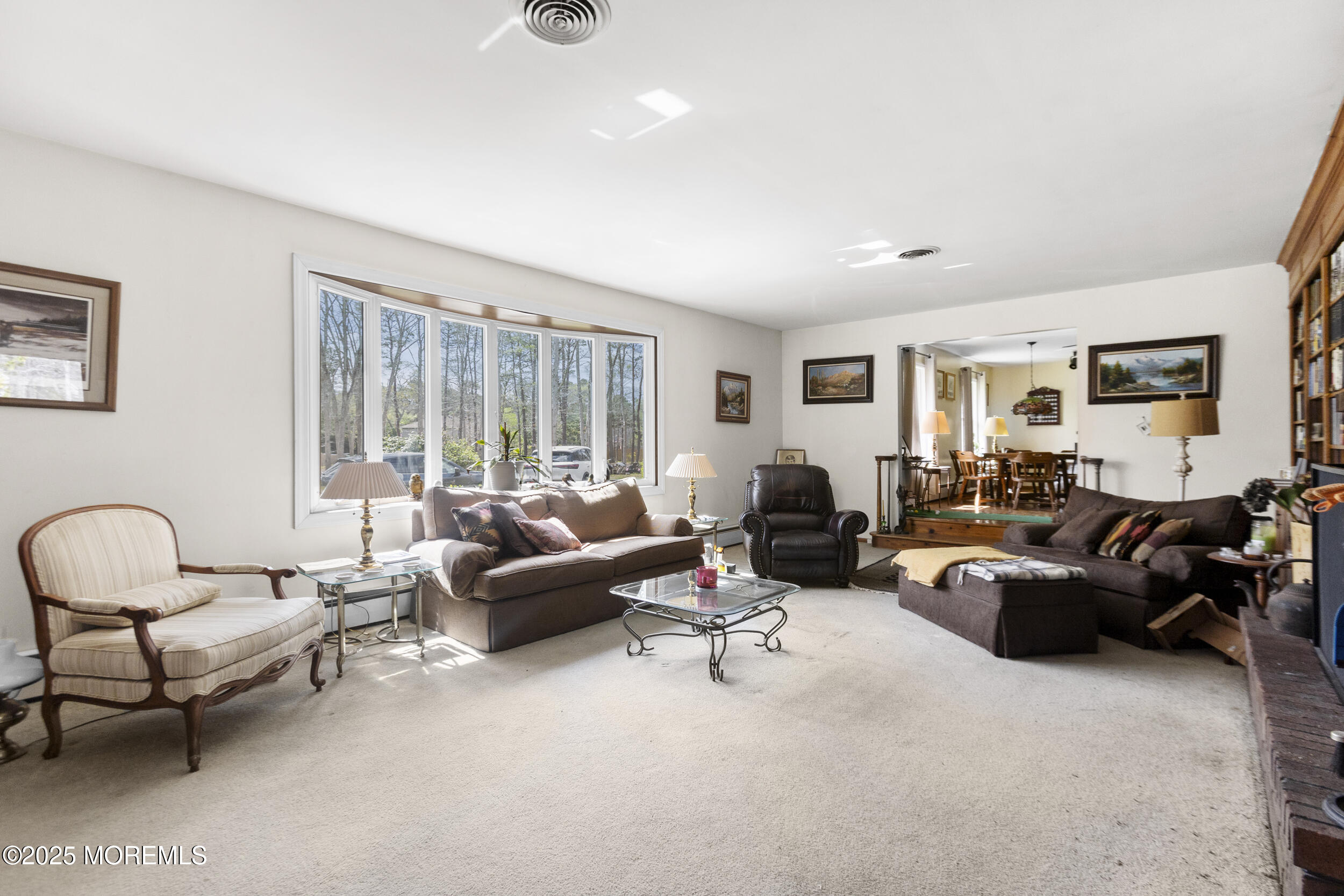 156 Sams Road Jackson, NJ 08527 - Photo 7 of 46 a living room with furniture and a large window