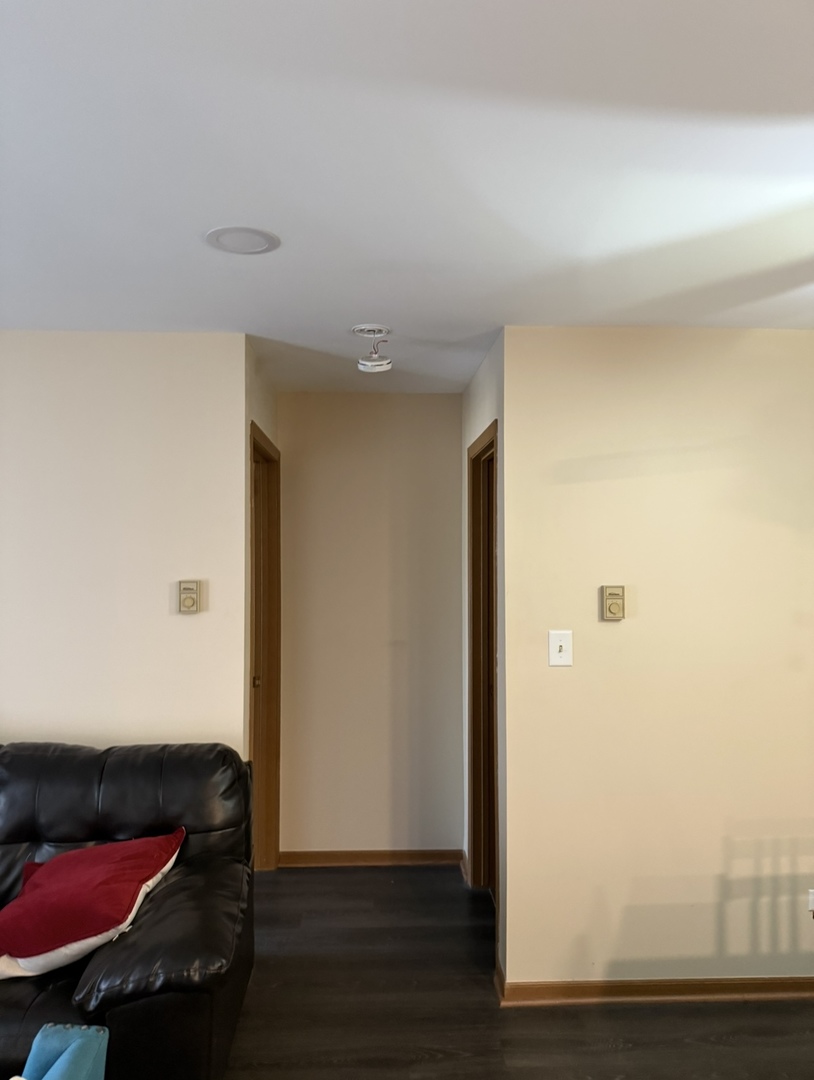 4304 West Shamrock Lane, Unit 1A McHenry, IL 60050 - Photo 10 of 20 a view of hallway with wooden floor