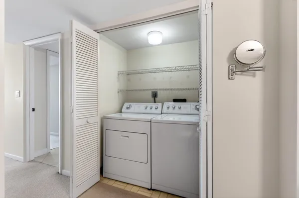 a view of a swimming pool with a lounge chairs