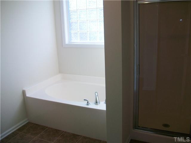 1507 Pattersons Mill Road Durham, NC 27703 - Photo 11 of 25 Relax in your seperate shower and tub in owner's suite!