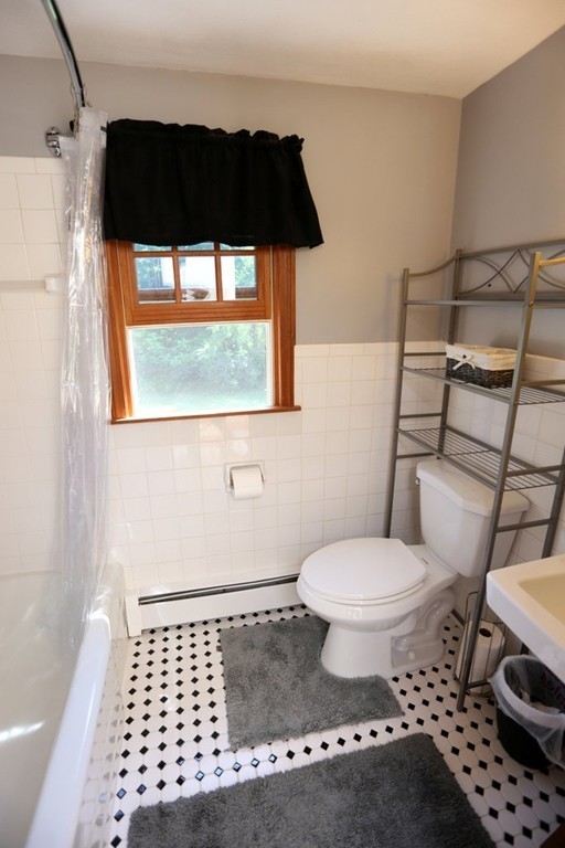 14 Fairview Road Wilbraham, MA 01095 - Photo 20 of 30 a bathroom with a toilet a sink and a window