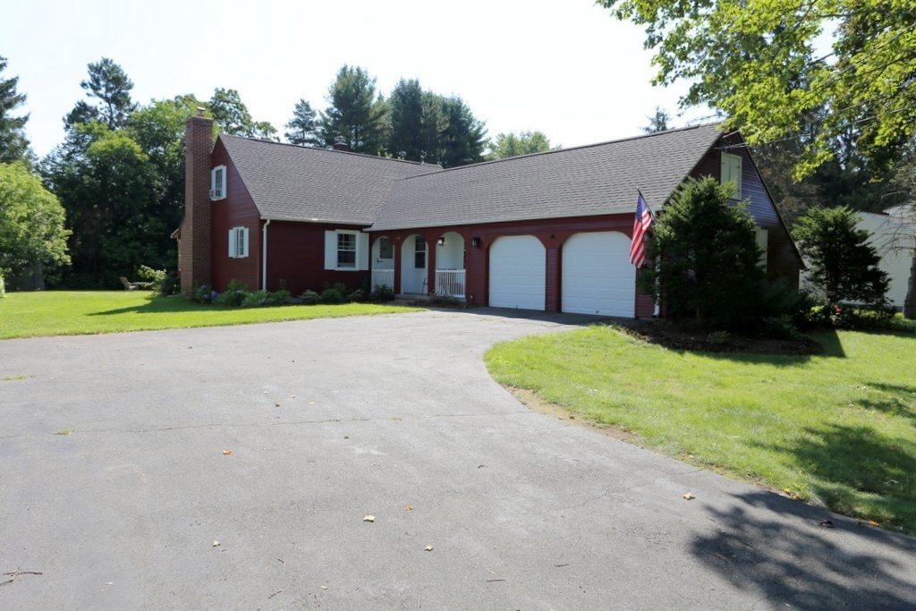 14 Fairview Road Wilbraham, MA 01095 - Photo 2 of 30 a front view of a house with a yard and garage