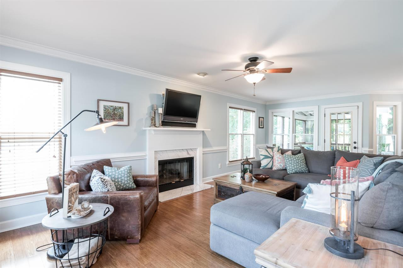 Front to back living room with same hardwood floors through the entire 1st floor, crown molding, beautiful chair rails, new paint on the walls and all trims and doors. Living Room