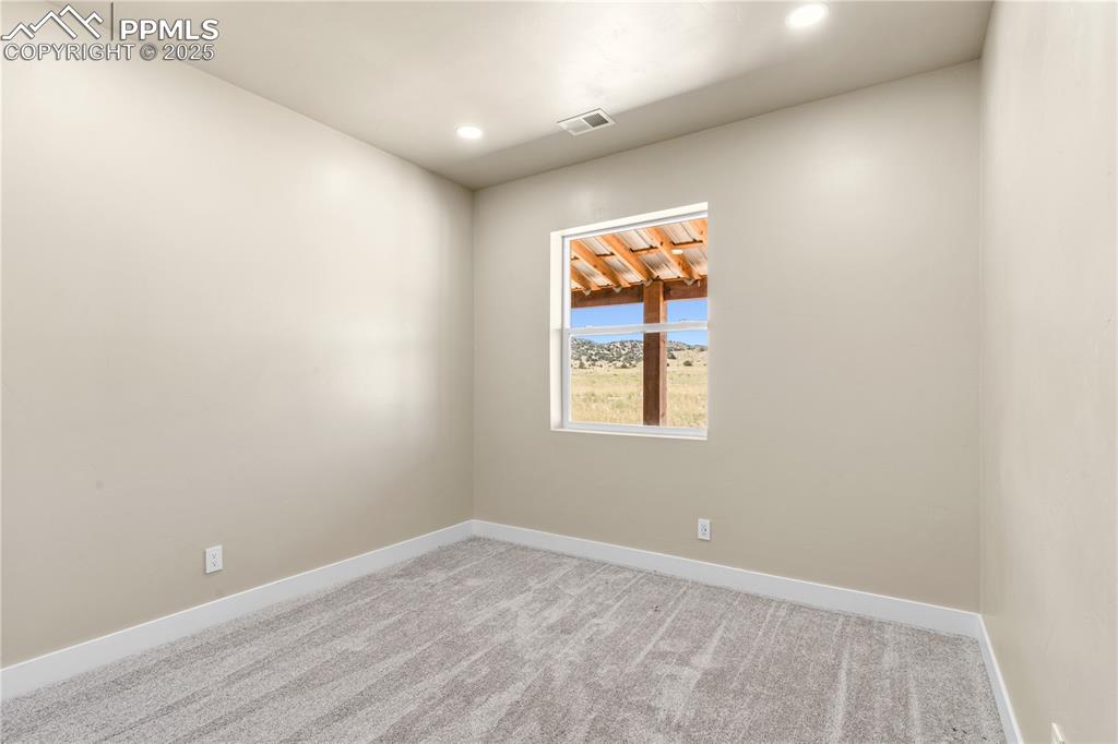 332 Yellow Bird Road Rye, CO 81069 - Photo 18 of 49 an empty room with a window