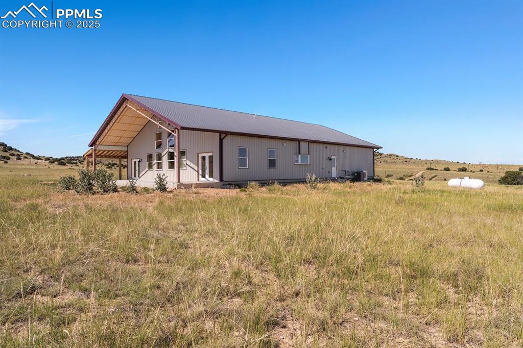 332 Yellow Bird Road Rye, CO 81069 - Photo 2 of 49 a house with trees in the background