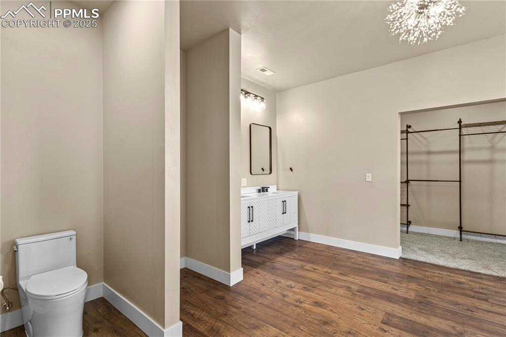 332 Yellow Bird Road Rye, CO 81069 - Photo 26 of 49 a bathroom with a toilet sink and a mirror