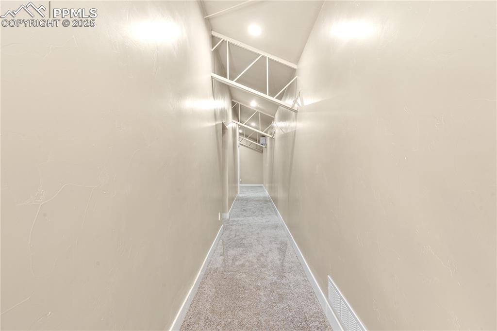 332 Yellow Bird Road Rye, CO 81069 - Photo 30 of 49 a view of a hallway with wooden floor and entryway