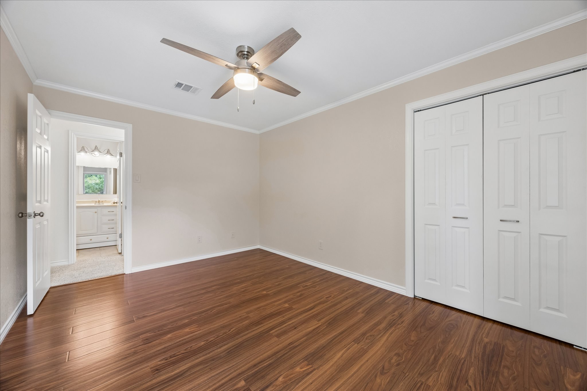 1306 Shady Grove Path Cedar Park, TX 78613 - Photo 28 of 40 a view of an empty room with wooden floor