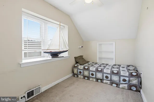 a bathroom with a toilet a sink and bathtub