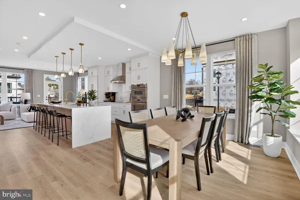 a room with a refrigerator and lots of clutter