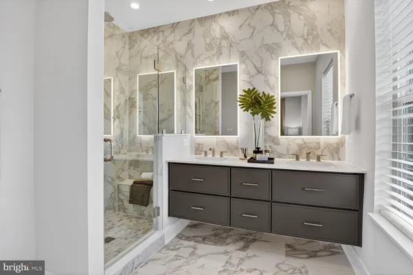 a bedroom with a bed and a chair