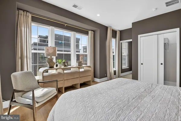a bathroom with a toilet a sink and bathtub