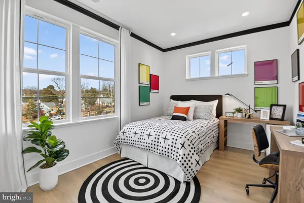 a view of a chairs and table in the balcony