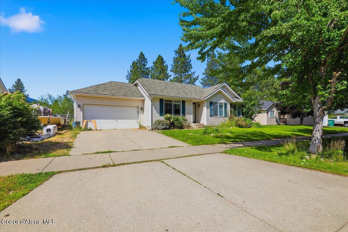7443 Macaw Lane Rathdrum, ID 83858 - Photo 2 of 28 02-7443 Macaw Ln_RedHogMedia