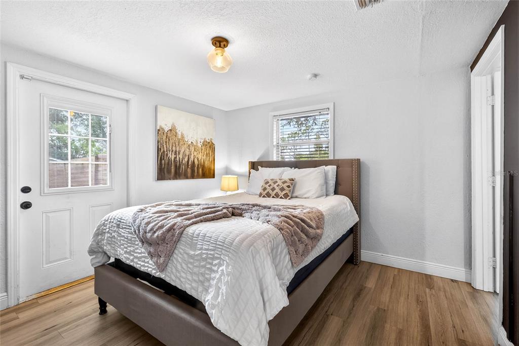 Undisclosed Address Riverview, FL 33578 - Photo 18 of 39 a bedroom with a bed and a window