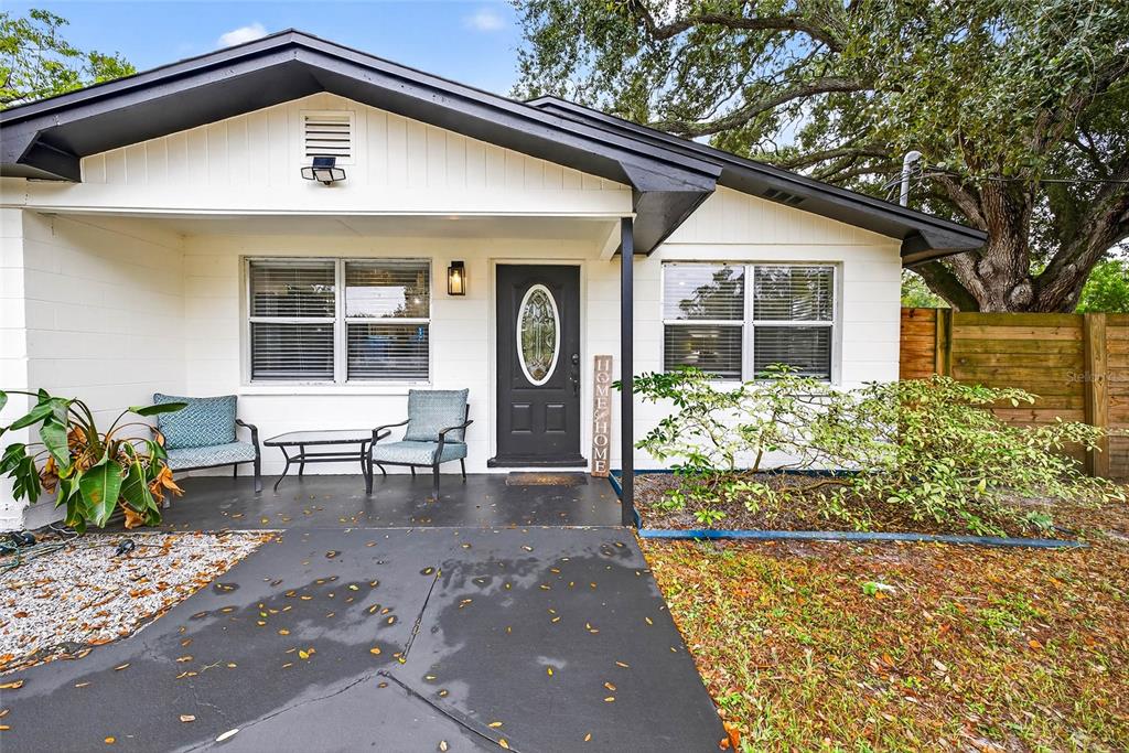 Undisclosed Address Riverview, FL 33578 - Photo 3 of 39 a front view of a house with a yard