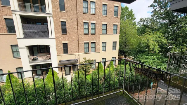 a balcony view with an outdoor seating space