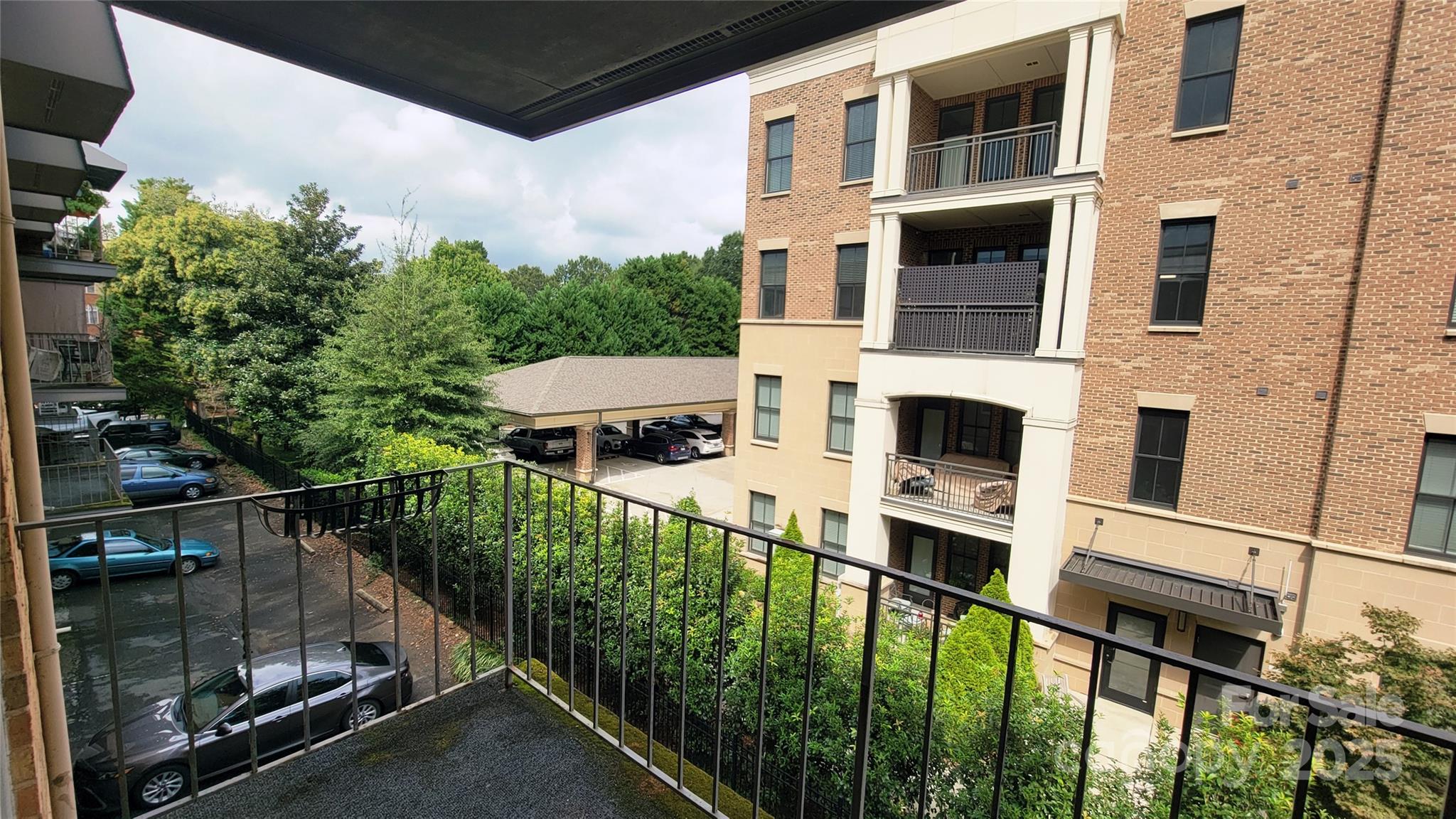 1323 Queens Road, Unit 320 Charlotte, NC 28207 - Photo 17 of 28 a balcony view with an outdoor seating space