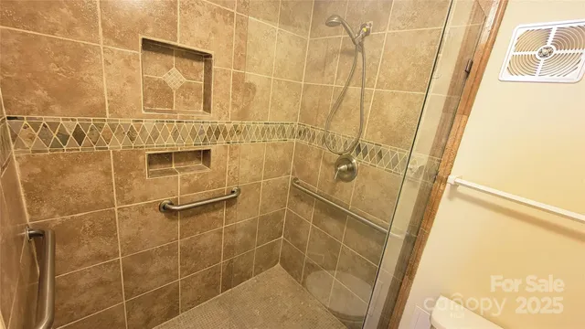a view of living room with a wooden floor