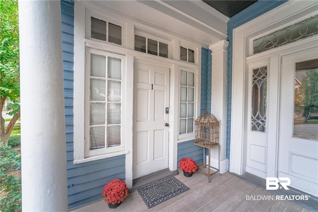 207 Michigan Avenue Mobile, AL 36604 - Photo 6 of 31 Doorway to property featuring covered porch