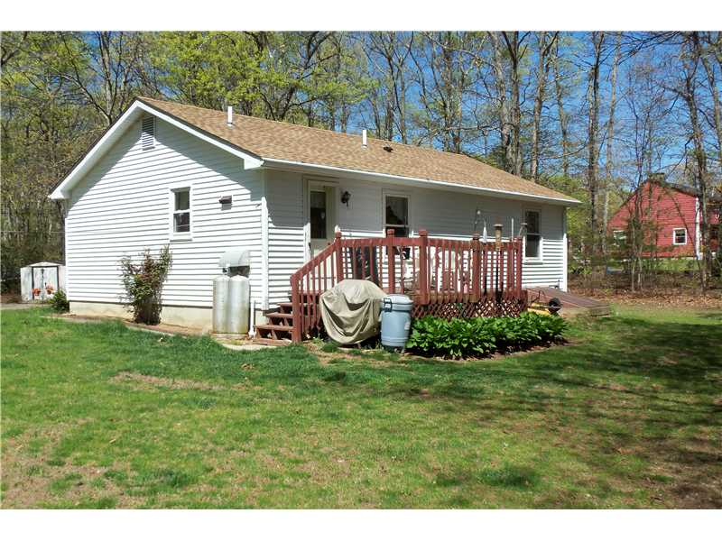 210 Skunk Hill Road Hopkinton, RI 02832 - Photo 2 of 10 Exterior Back. open spacious rear and wooded acre