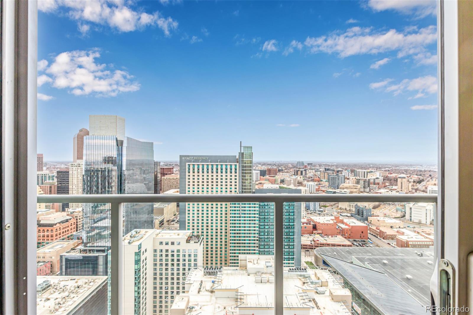 a view of a city from a balcony