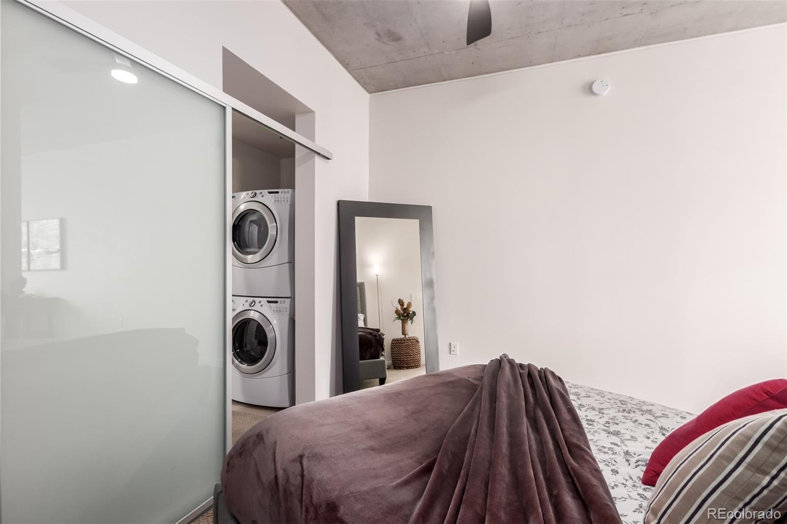 891 14th Street, Unit 3812 Denver, CO 80202 - Photo 21 of 50 a bedroom with a bed and a window