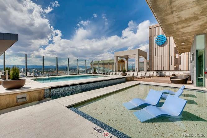 891 14th Street, Unit 3812 Denver, CO 80202 - Photo 31 of 50 a view of swimming pool with outdoor seating