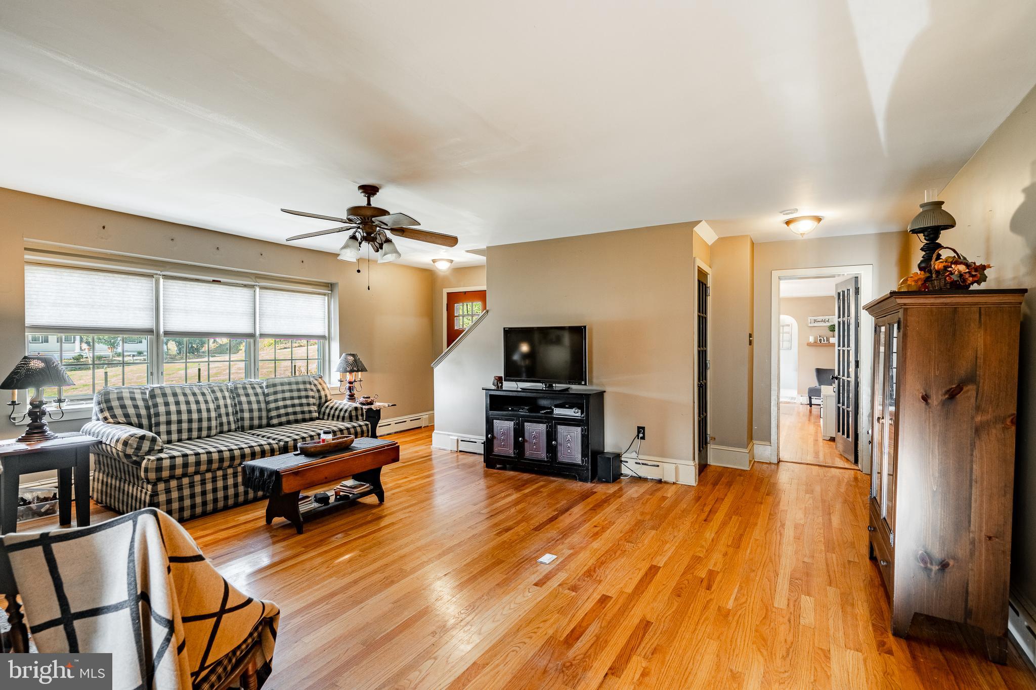 779 Concord Road Glen Mills, PA 19342 - Photo 19 of 64 a living room with furniture and a flat screen tv