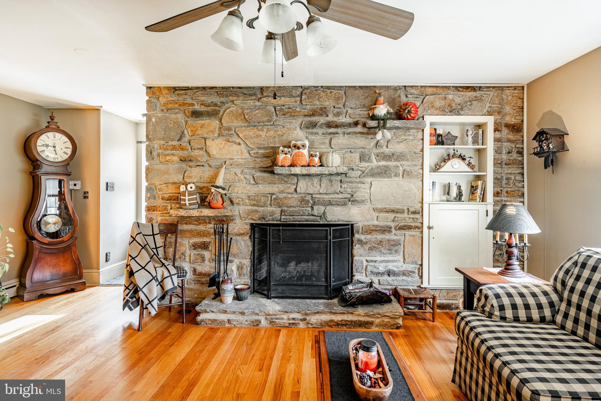 779 Concord Road Glen Mills, PA 19342 - Photo 22 of 64 a living room with furniture and a fireplace