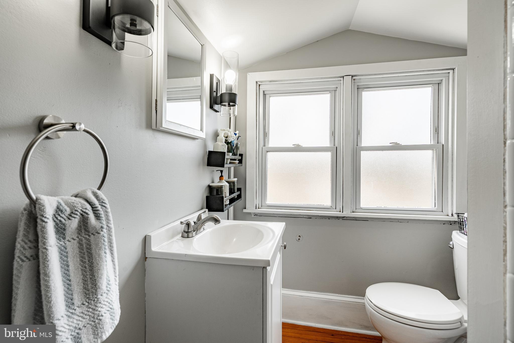 779 Concord Road Glen Mills, PA 19342 - Photo 41 of 64 a bathroom with a sink a toilet and a mirror