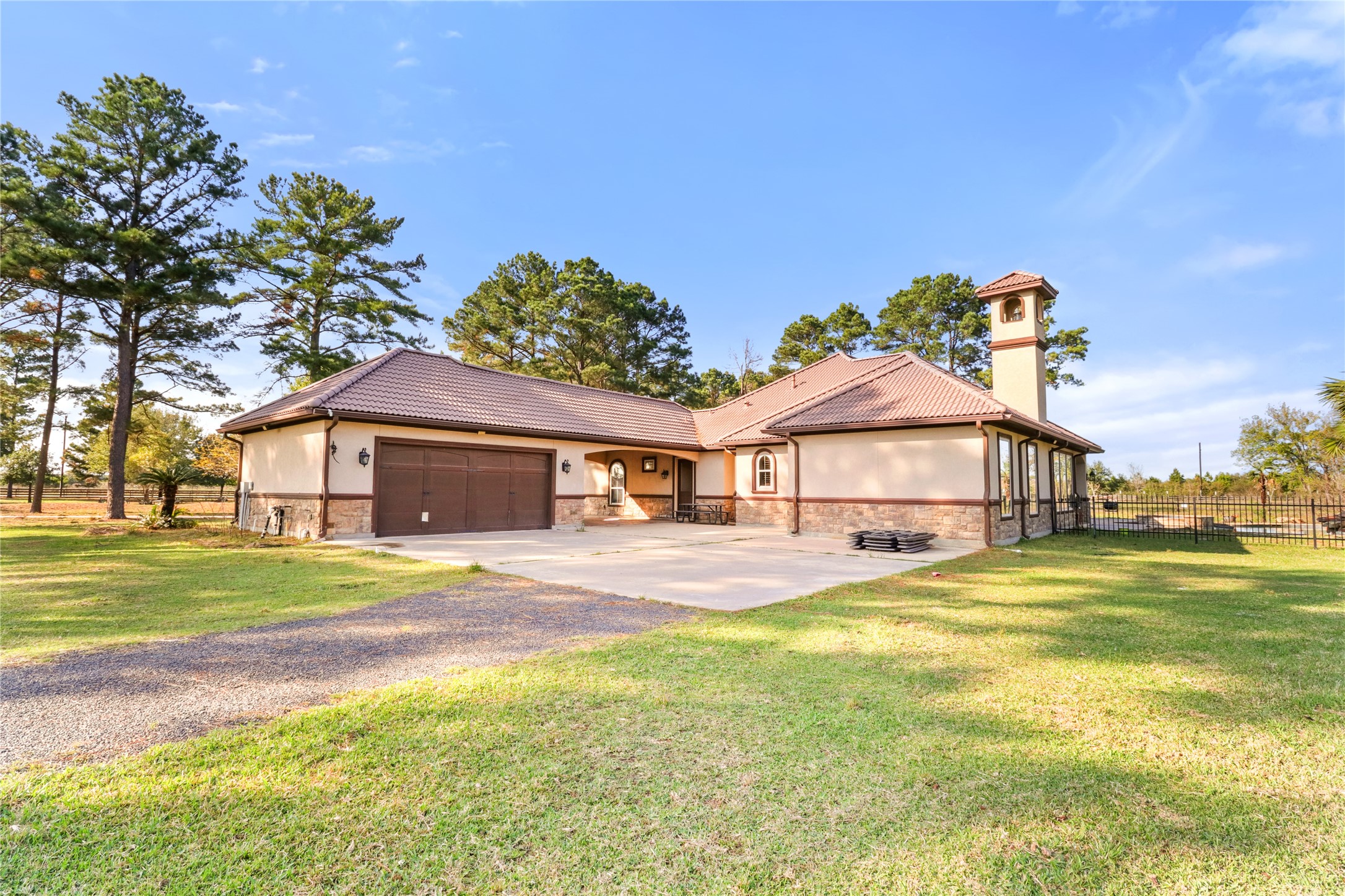 26325 Bauer Hockley Road Hockley, TX 77447 - Photo 13 of 40 a front view of a house with a garden
