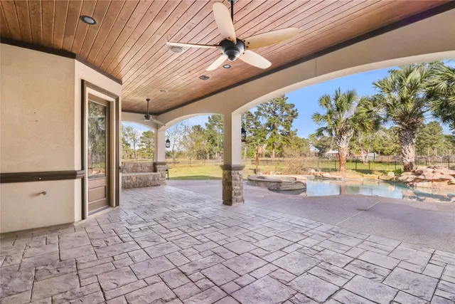 a view of a balcony with wooden floor