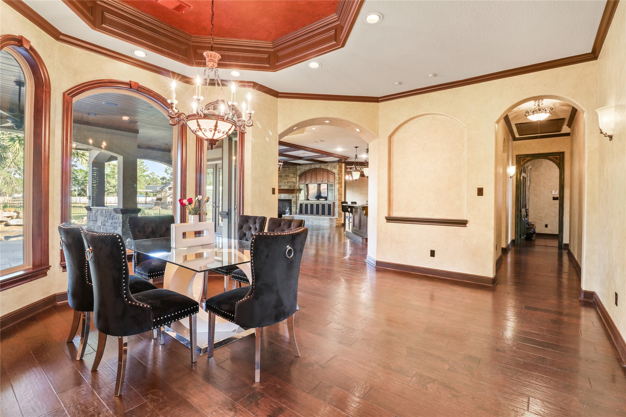 26325 Bauer Hockley Road Hockley, TX 77447 - Photo 19 of 40 a view of a dining room with furniture wooden floor and chandelier
