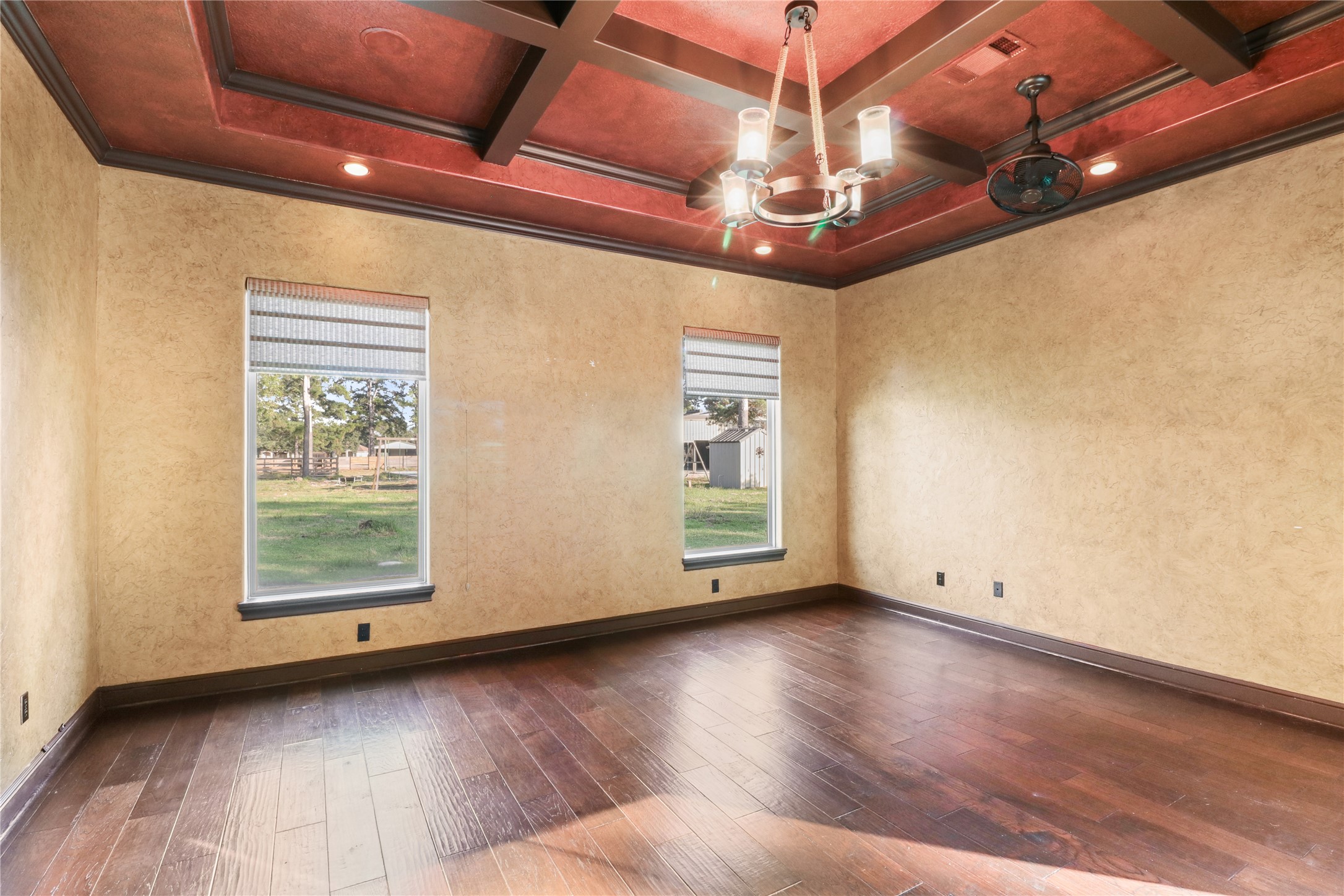 26325 Bauer Hockley Road Hockley, TX 77447 - Photo 32 of 40 a view of an empty room with wooden floor and a window