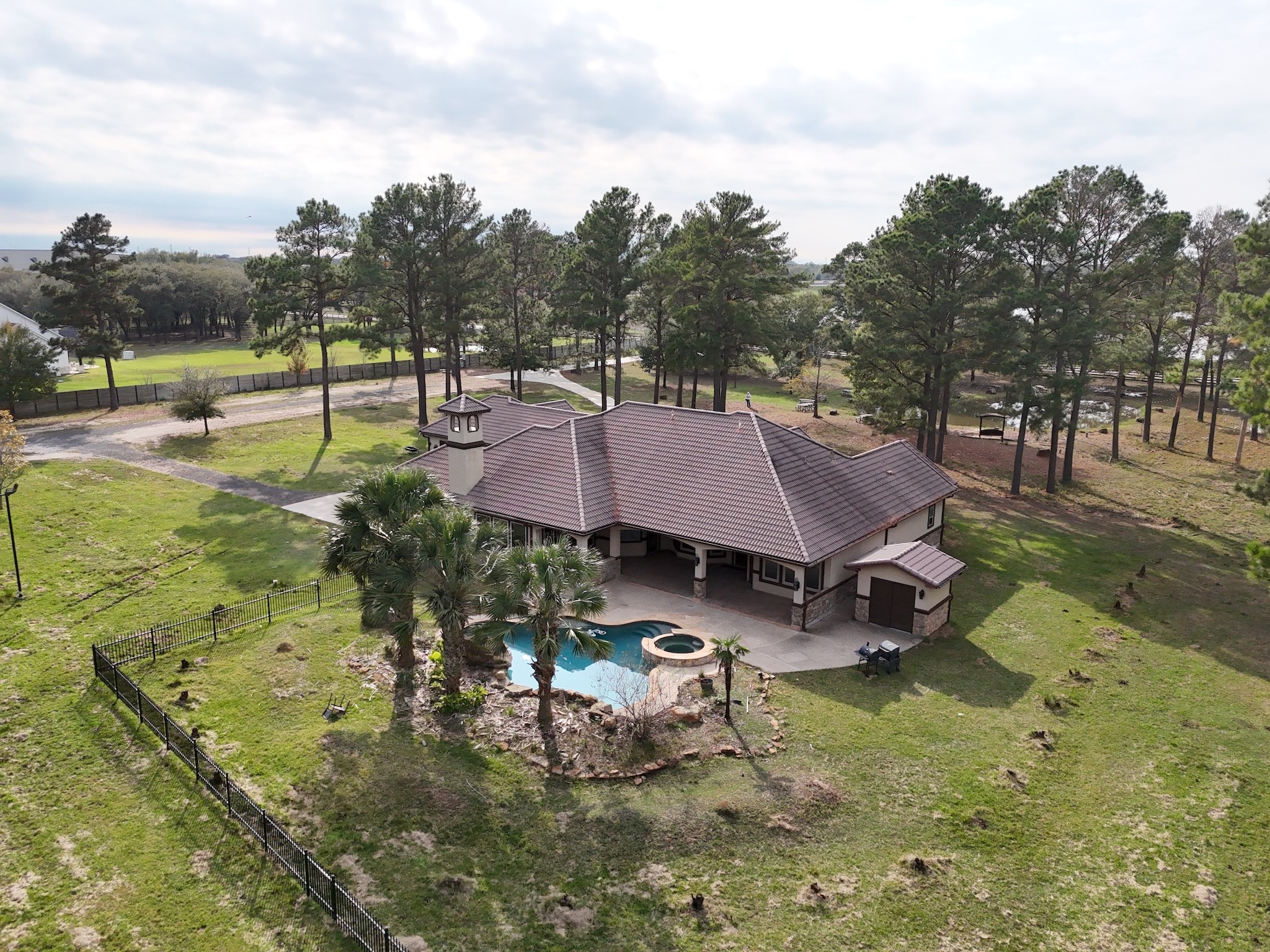 26325 Bauer Hockley Road Hockley, TX 77447 - Photo 7 of 40 a aerial view of a house with swimming pool and next to a yard