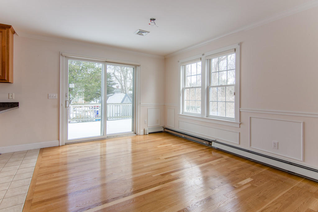 172 Leeward Road Bourne, MA 02532 - Photo 39 of 66 a view of an empty room with wooden floor and a window