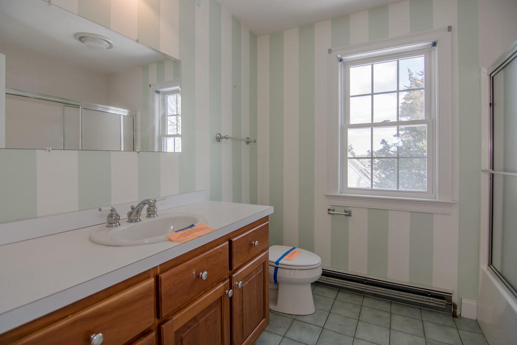 172 Leeward Road Bourne, MA 02532 - Photo 54 of 66 a bathroom with a sink toilet and vanity