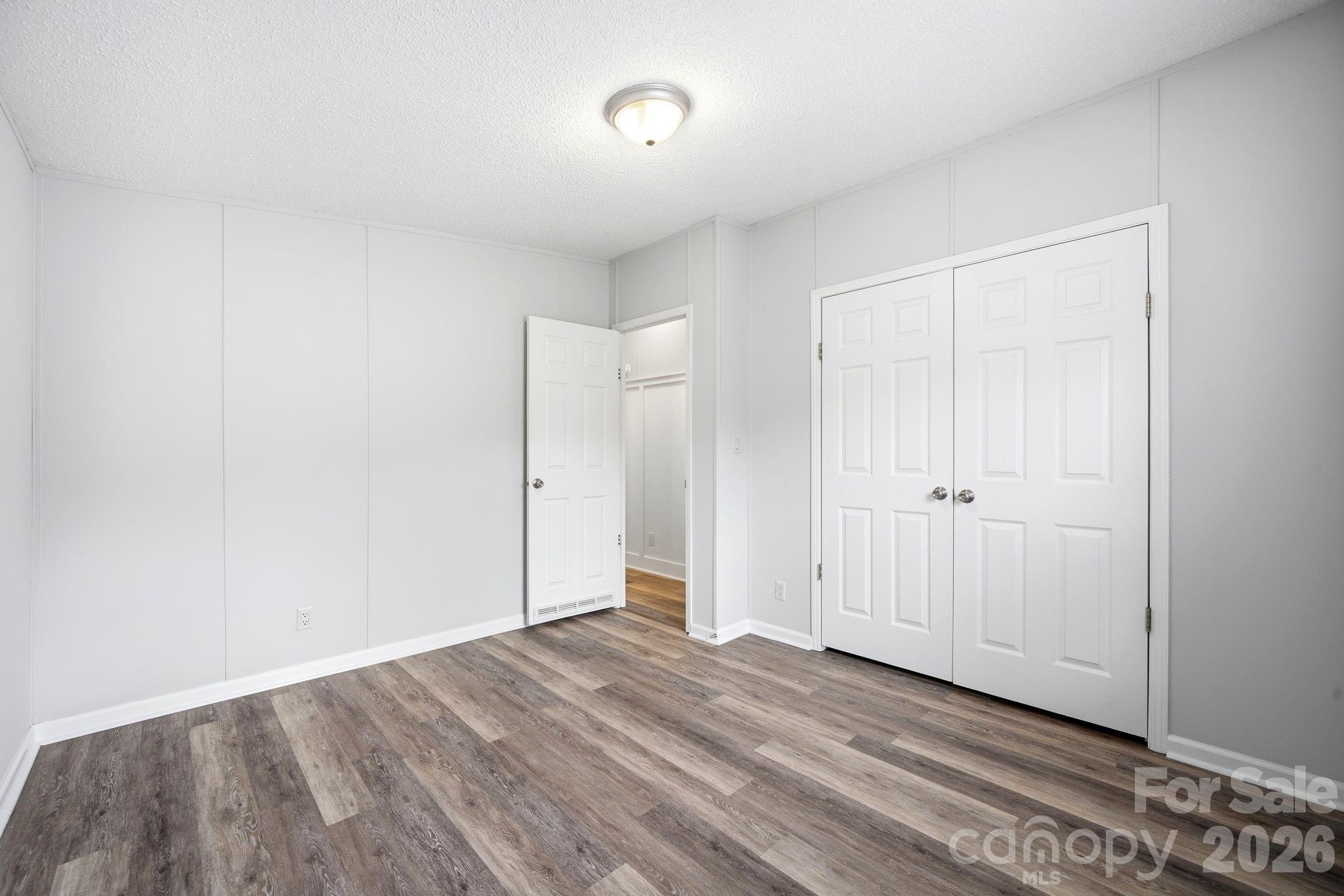 2368 Beth Haven Church Road Denver, NC 28037 - Photo 24 of 42 a view of a room with wooden floor and a window