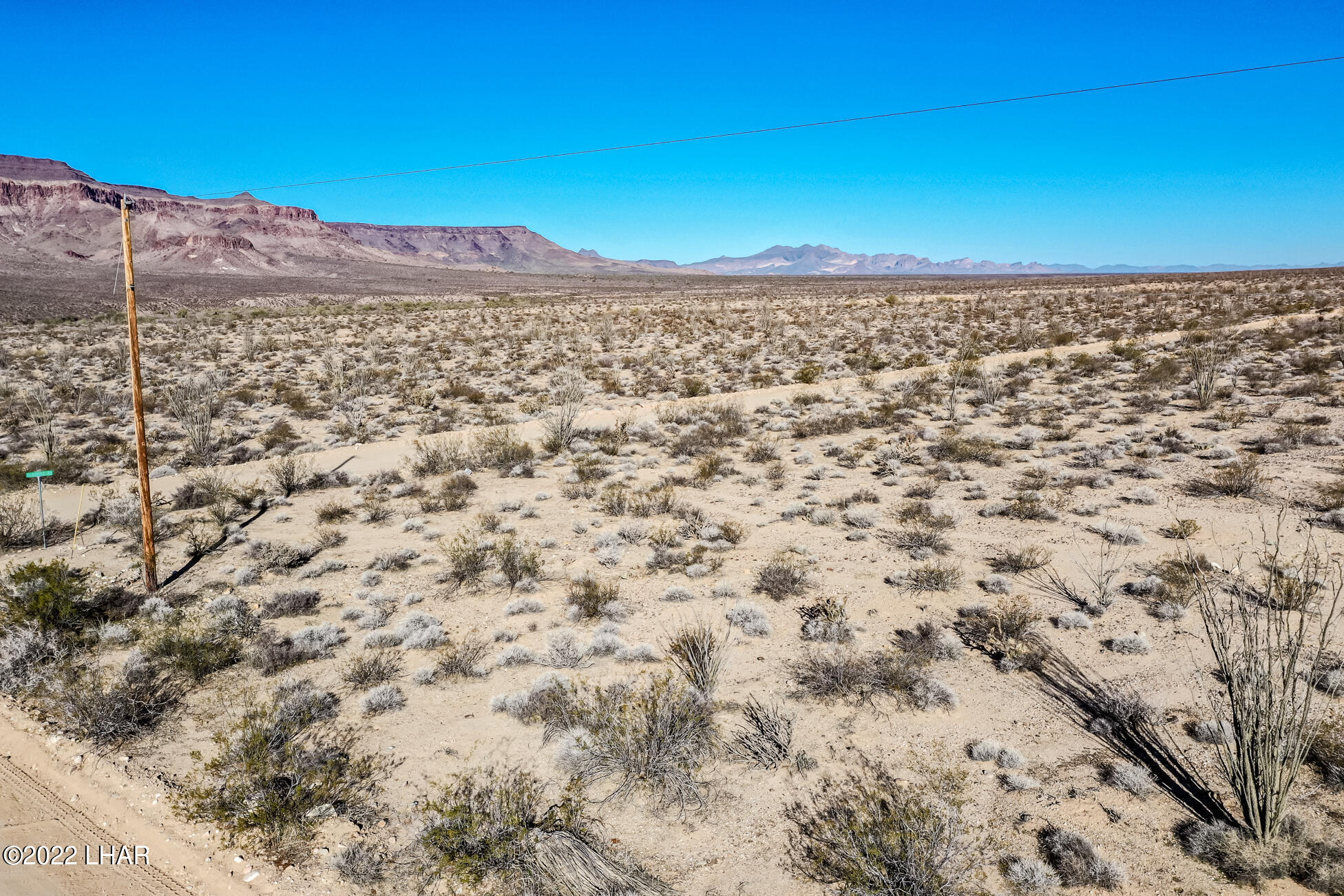 109 South McDowell Road Yucca, AZ 86438 - Photo 20 of 41 109A-BMcDowellRdSDrone_09