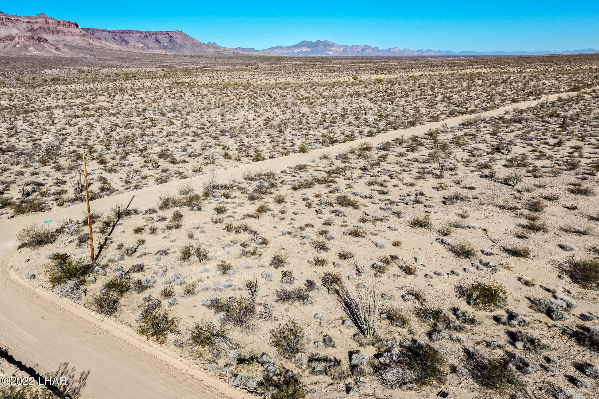 109 South McDowell Road Yucca, AZ 86438 - Photo 21 of 41 109A-BMcDowellRdSDrone_10