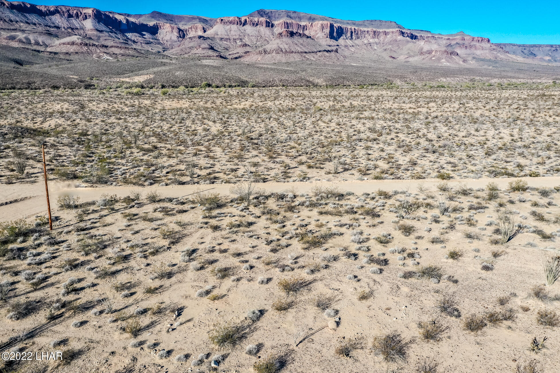 109 South McDowell Road Yucca, AZ 86438 - Photo 22 of 41 109A-BMcDowellRdSDrone_11